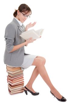 business woman  in spectacles and book on white