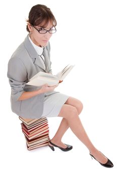 business woman  in spectacles and book on white