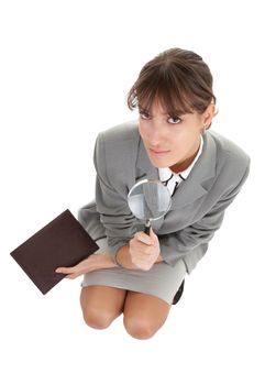 young girl in a gray business suit on white background