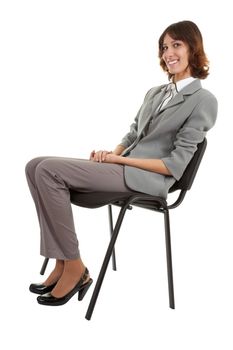 young girl in a gray business suit on white background