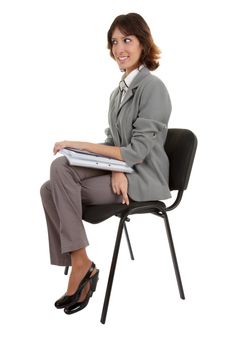 young girl in a gray business suit on white background