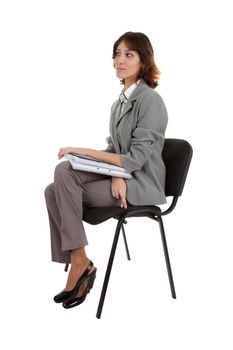 young girl in a gray business suit on white background