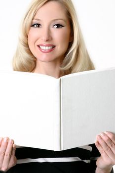 A smiling woman holding an open blank hardcover book 
- soften skin