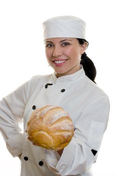 A smiling chef holding a loaf of bread.