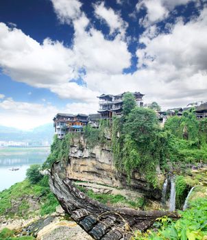 a scenery Chinese minority village best known in the movie Furongzhen