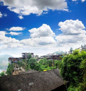 a scenery Chinese minority village best known in the movie Furongzhen