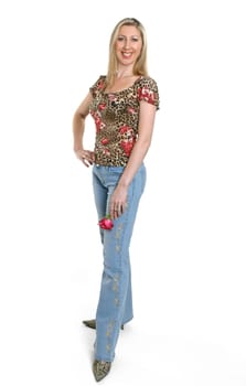 Woman wearing casual clothing stands against a white background