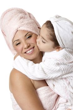 Smiling mother and daughter at bathtime