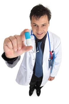 A friendly doctor or pharmacist is holding medication