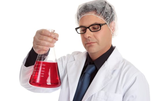 A chemist or laboratory worker holding a large flask of liquid.