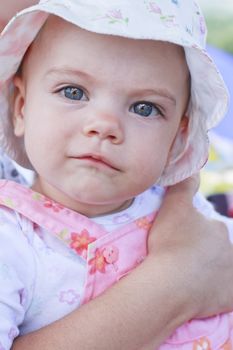 Smiling baby girl with blue eyes