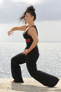 Gracefully moving through a set of movements.


