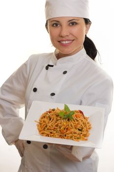 Chef holding plate of pasta