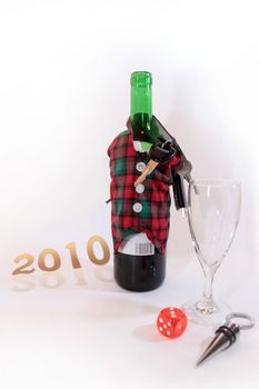 bottle dressed in jacket warmer with keys as arms on white background depicting drunk driving and addictions can kill