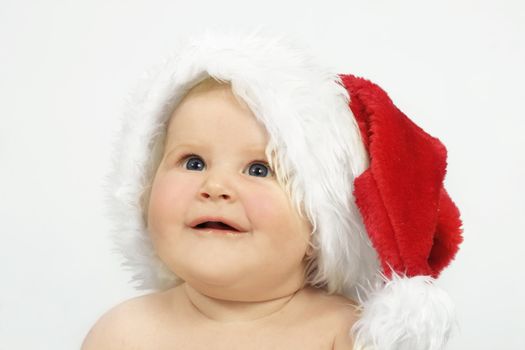 Cute baby in a Santa Hat on white