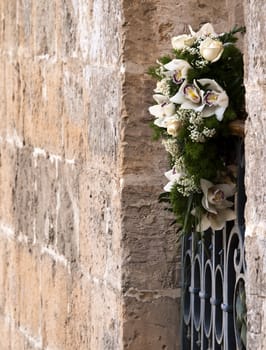 A beautiful bridal bouquet on balcony in Malta