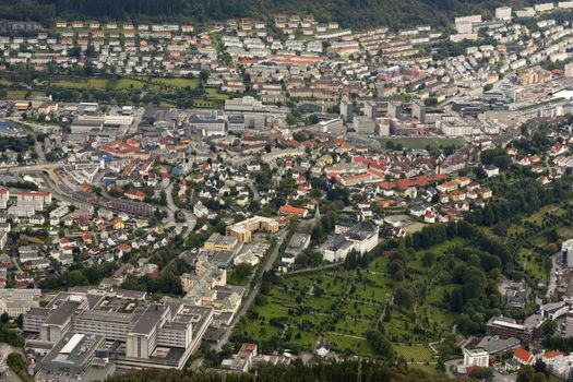 View over Bergen from from the Ulriksbanen gondol. Haukeland University Hospital at lower left, Kronstad in the back, and Mollendal at the right.