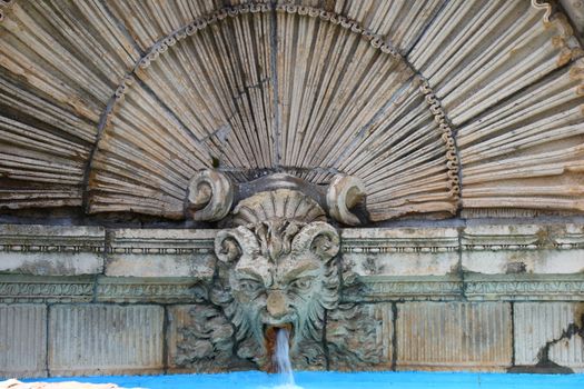 old stone fountain at castle gardens