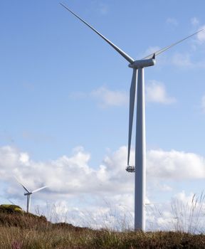 Maintaince crew working on a windmill.