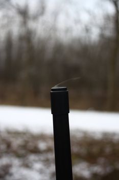 a rifle is smoking after shotting off a few rounds