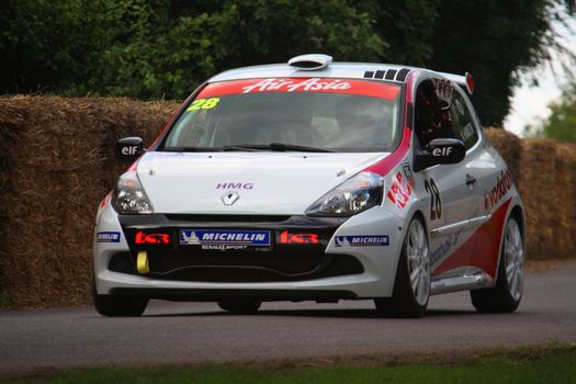 Nick Hamilton driving his Renault Clio cup racecar