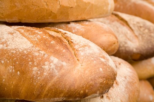 Whole wheat bread on a market stall. Shallow focus.