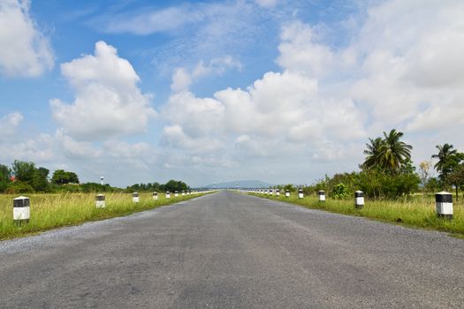 Road asphalt to mountain island