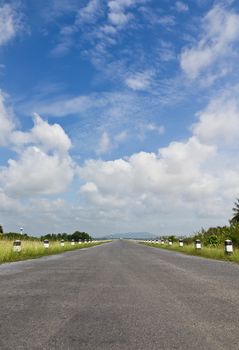 Road asphalt to mountain island