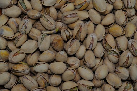 a bunch of pistachio nuts as an Abstract background texture