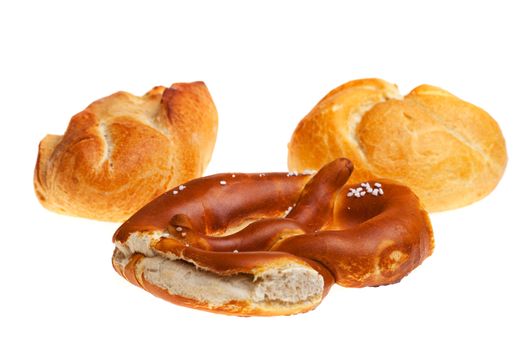 bavarian pretzel and bun isolated on white background