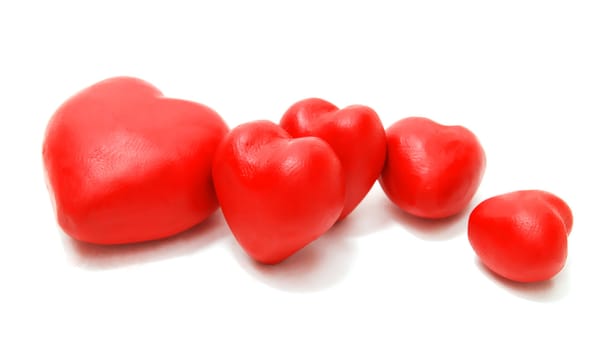 Valentine's 3D Red Hearts Laying Random Made of Clay Isolated on White Background