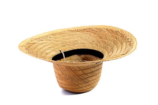 Straw hat from the sun for working farmers on a white background.