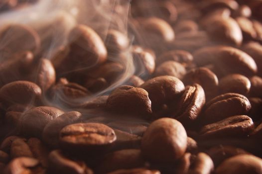 roasting coffee beans with smoke and steam