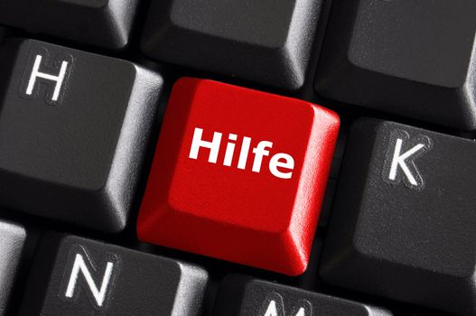 german word hilfe showing help or assistance concept with keyboard