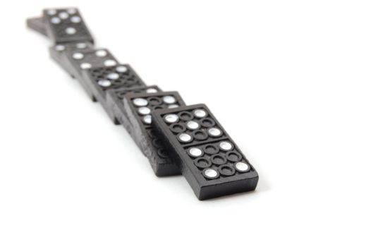 chain of dominoes isolated on a white background