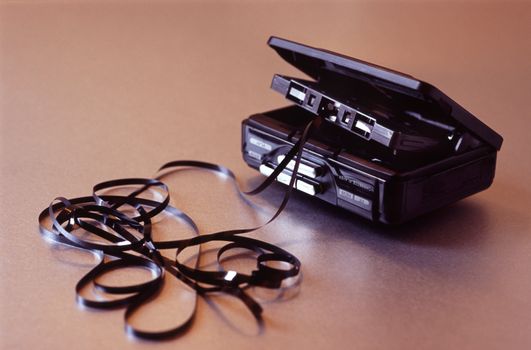 A cassette player with chewed tape