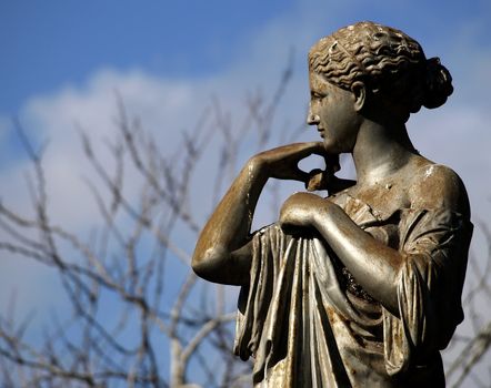 Medieval statue in a public garden