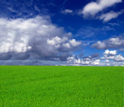 Conceptual image showing amazing blue skies over green meadows