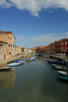 A view up a canal on the island of Murano, Venice.