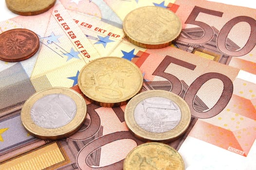 macro of euro bills and coins can be used as background