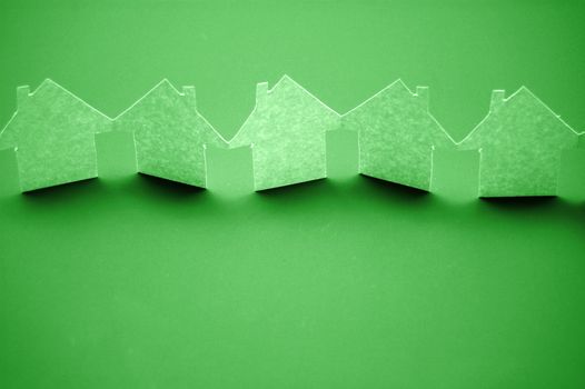 paper houses or homes showing a concept for real estate