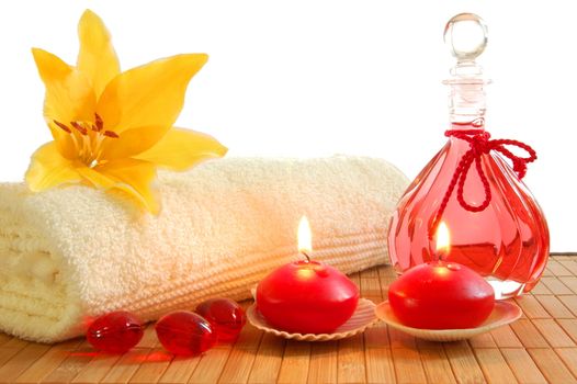 red massage still life with towel candles and copyspace
