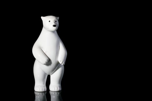 Toy - a polar bear as an ornament for winter holidays.