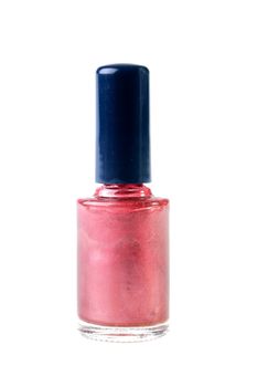 The small bottle with pink nail polish, is used in the course of manicure.