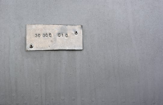 Brushed grunge metallic plate useful for backgrounds