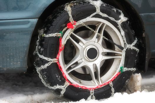 winter chains of anti-skid on a motor-car wheel