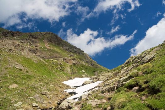 summer view of alpine pass in val di Fassa, Italian dolomites. Photo taken with polarized filter