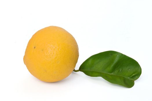 ripe fresh orange with leaf isolated on white background