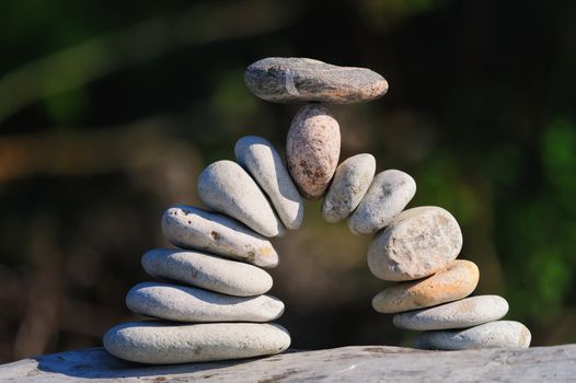 Set of white pebbles curved in an arc
