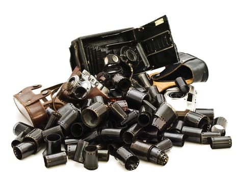 retro photo accessory with many films and vintage cameras against the white background